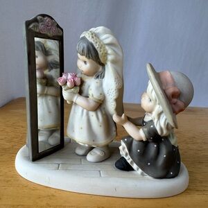 Enesco Figurine Collectible “The Final Touches” 
Bride before the wedding.